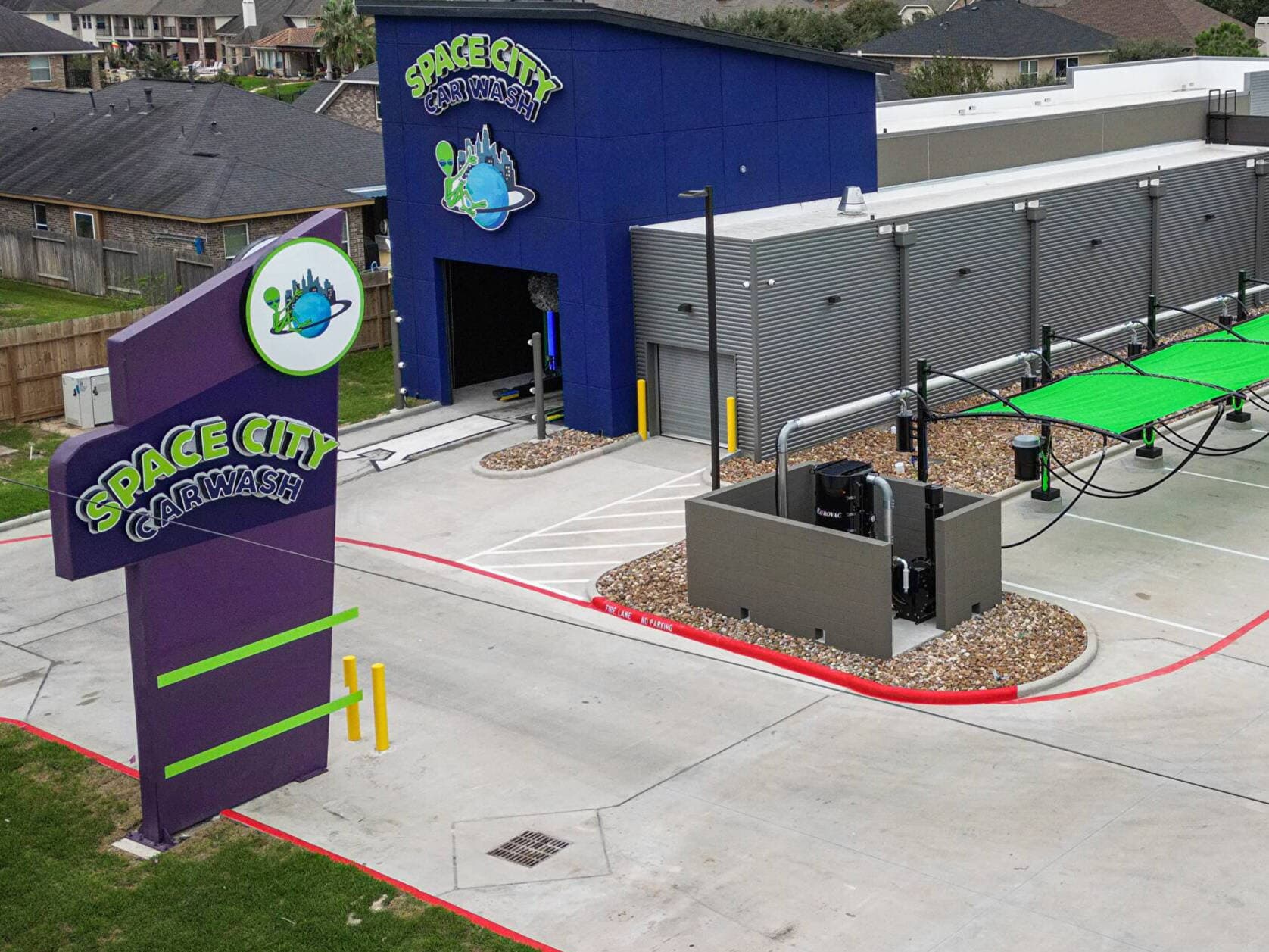 Aerial view of Space City Car Wash at 17955 Huffmeister Road in Cypress